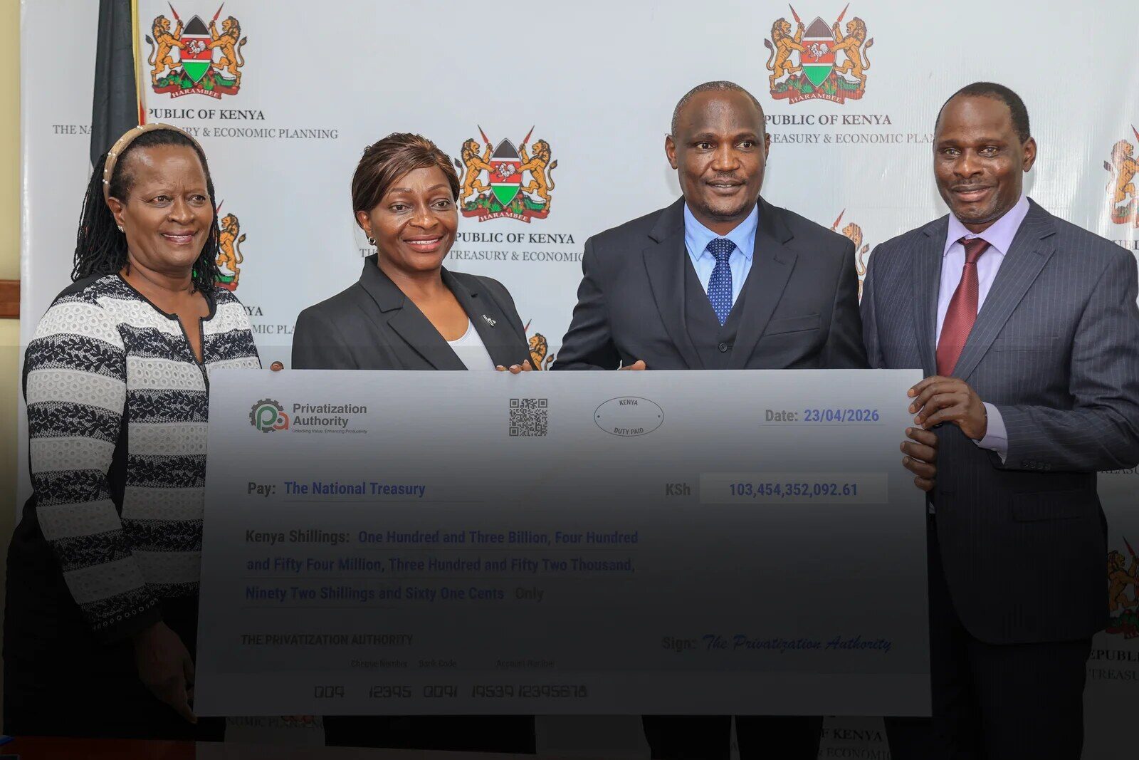 Privatization Authority officials presenting treasury transfer cheque